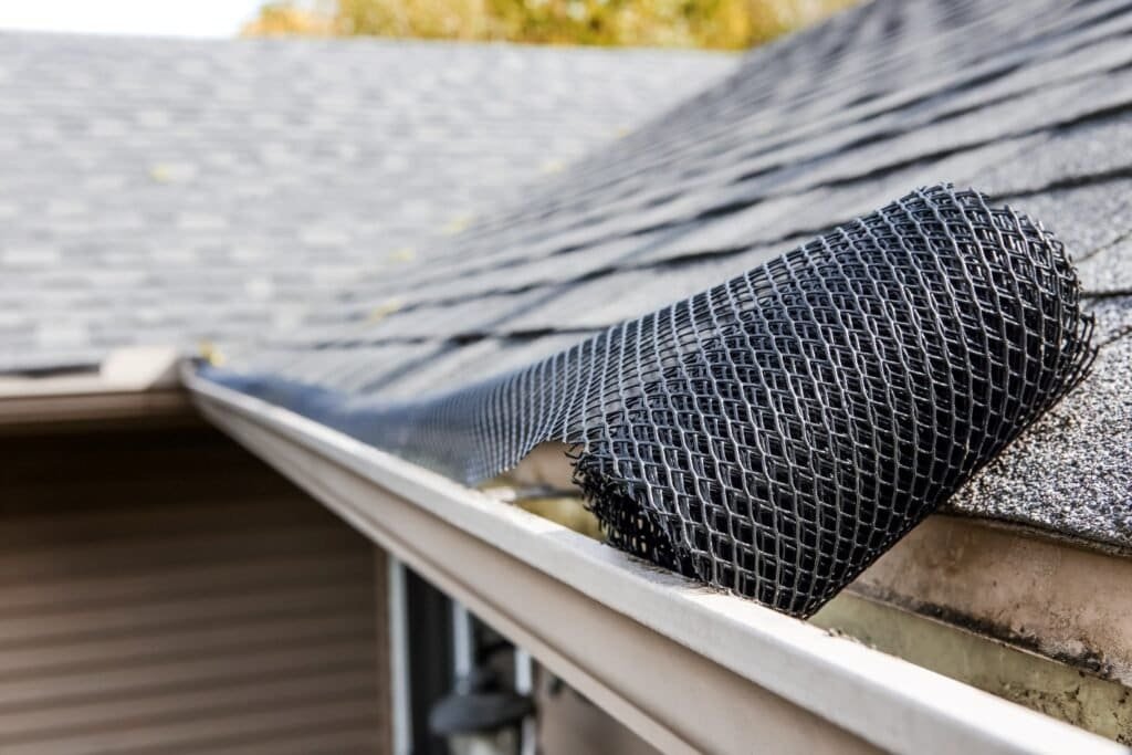 Image of clean gutters in Perth getting DIY gutter guard installed